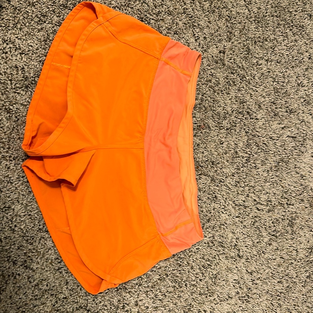 Orange Lululemon shorts